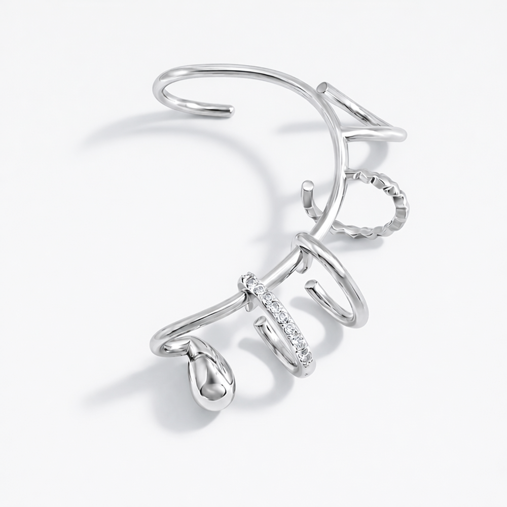 Sterling silver sculptural ear cuff, layered multi-ring design, no piercing required