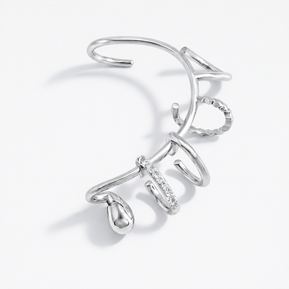 Sterling silver sculptural ear cuff, layered multi-ring design, no piercing required