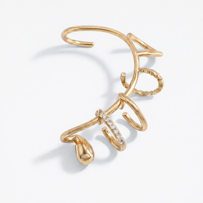 Gold vermeil layered ear cuff, sculptural stacked rings, no piercing